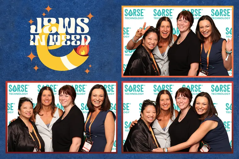 Photo booth strip of four women laughing together
