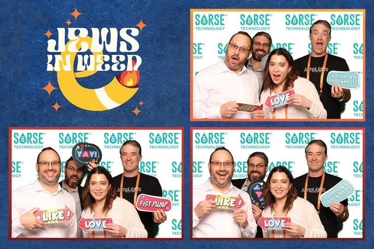 Photo booth strip of five guests holding heart props