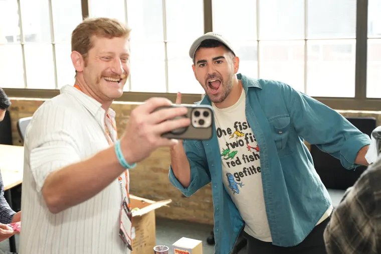 Two attendees taking a selfie